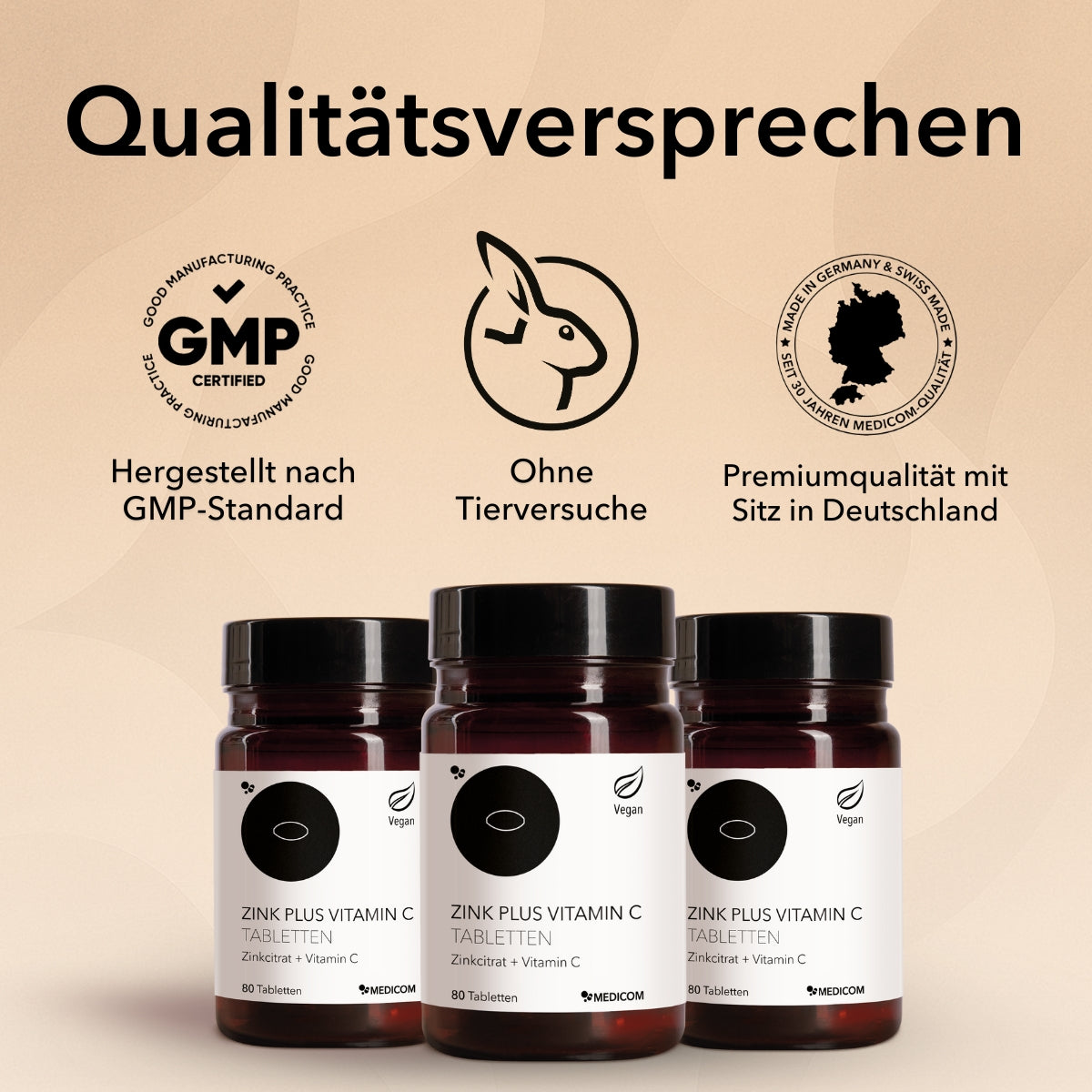 Zink Plus Vitamin C Tabletten von Medicom. Drei Produktdosen im Vordergrund. Siegel und Zertifikate zum Produkt. Qualitätsversprechen wie hergestellt nach GMP-Standard, ohne Tierversuche, Premium-Qualität mit Sitz in Deutschland