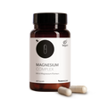 Die Produktdose von Magnesium Complex mit sechs verschiedenen Magnesium-Formen und zwei Kapseln im Vordergrund